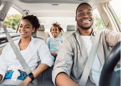 happy family driving in car