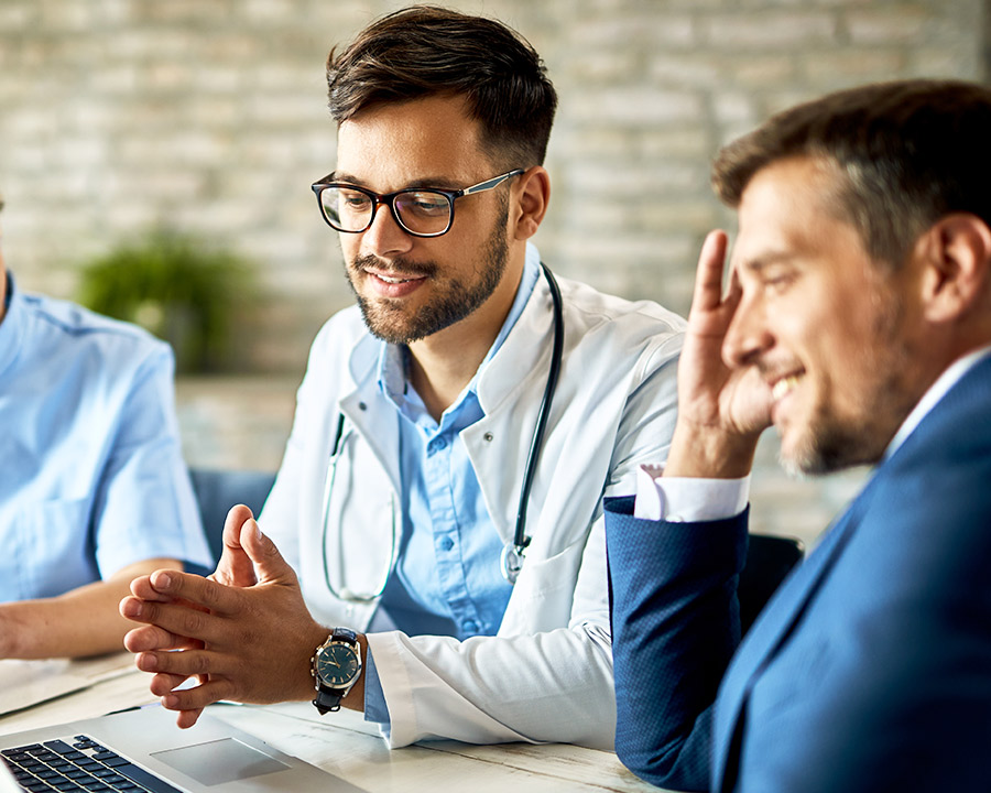 doctor having meeting with healthcare professionals