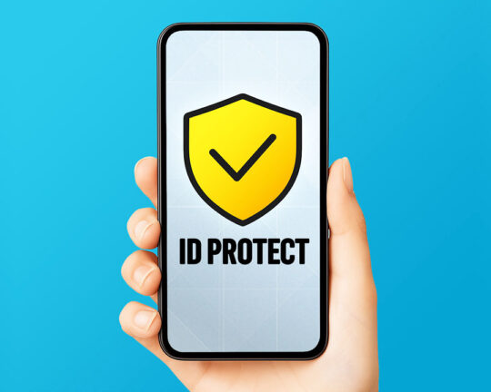 hand holding mobile phone with screenshot of completecare checking id protect benefit logo