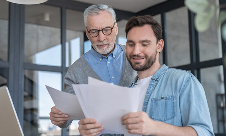 Father and son managing debt together