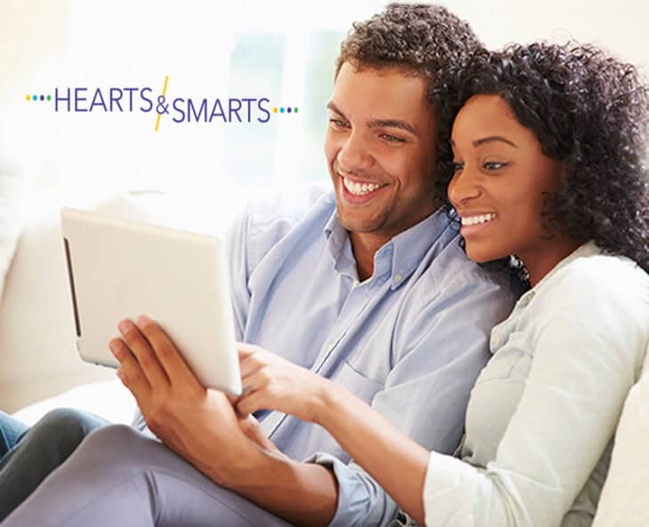 happy couple on laptop