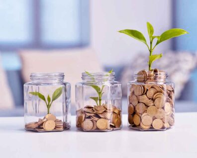 3 jars of money and plants symbolizing growth
